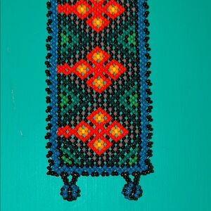 Handmade Beaded Bracelet with Orange and Blue Pattern